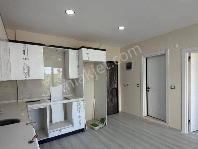Kuşadası Güzelçamlı Merkezde Satılık Sıfır 1+1 Daire