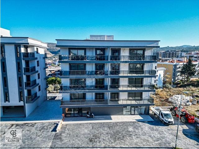 Kuşadası İkiçeşmelik te havuzlu sitede satılık 2+1 daire
