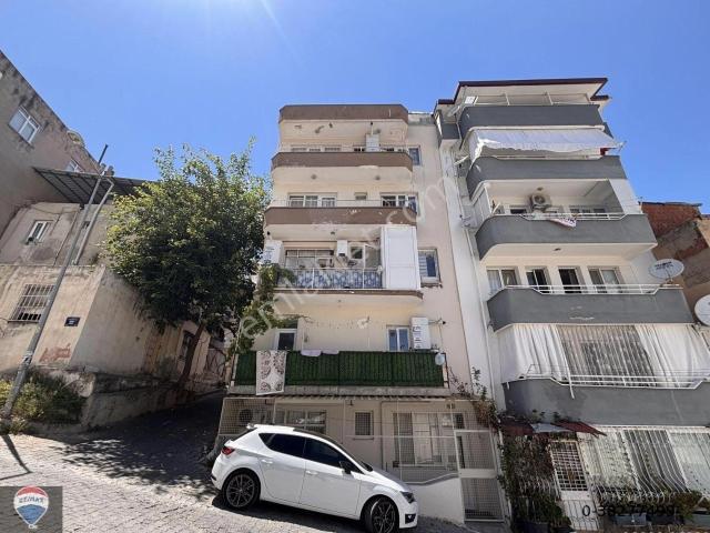 Kuşadası İki Çeşmelik Mahallesi’nde Merkezi Konumda | 2+1 Ayrı Mutfak | Ara Kat Satılık Daire