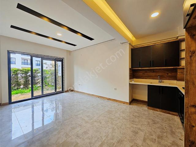 Kuşadası İkiçeşmelik'te Doğalgazlı, Bahçeli Kiralık 1+1 Daire