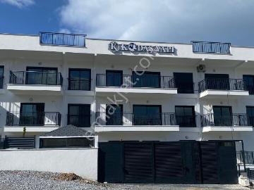 Kuşadası Kadınlardenizi Mahallesinde Denize 50 Mt Mesafede Havuzlu Sitede Satılık 3+1 Sıfır Daire