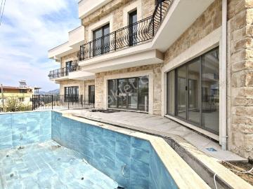 Kuşadası Soğucak 'ta Satılık Özel Mimari Taş Ev Villa