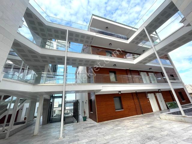 Kuşadası Türkmen'de Deniz Manzaralı Doğalgazlı Kiralık 3+1 Daire