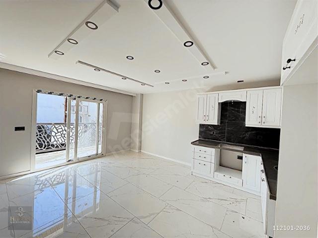 KUŞADASI DAVUTLAR MERKEZDE SATILIK 2+1 ARAKAT DAİRE