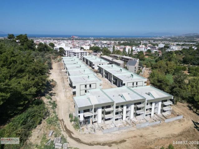 KUŞADASI DAVUTLAR OKAİJEN PROJESİNDE DOĞAYLA İÇ İÇE, KONFORLU 1+1 DAİRE!