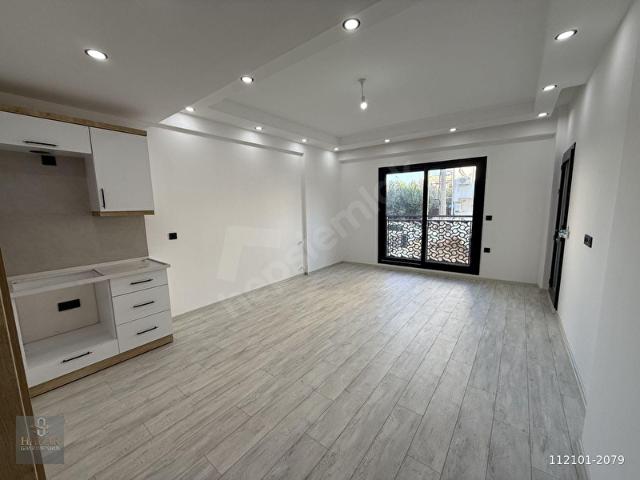 KUŞADASI DAVUTLARDA SATILIK ÖZEL BAHÇELİ 2+1 DAİRE