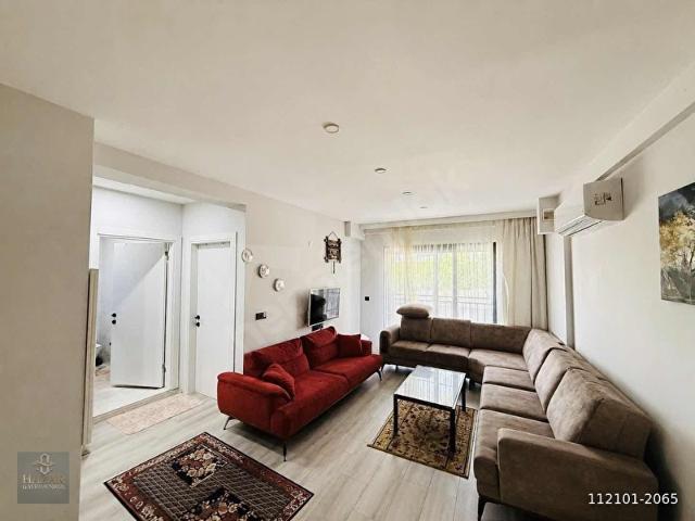 KUŞADASI DAVUTLARIN KALBİNDE SATILIK EŞYALIBAHÇELİ 1+1 DAİRE