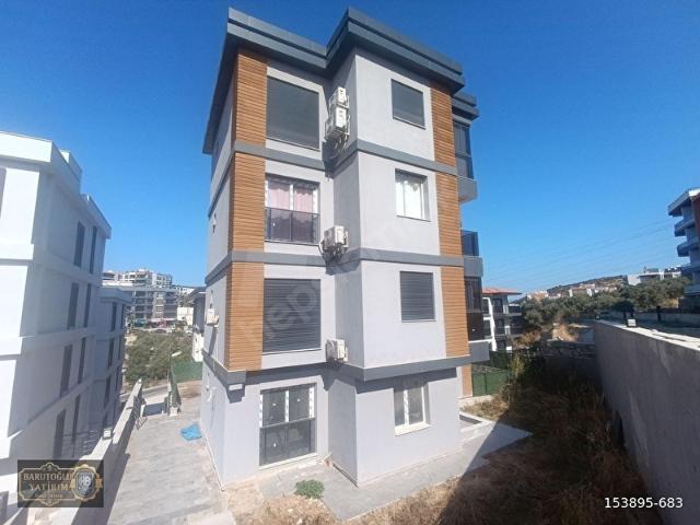 KUŞADASI GARAJ ARKASI YENİ YERLEŞİM BÖLGESİNDE GENİŞ BAHÇELİ 1+1
