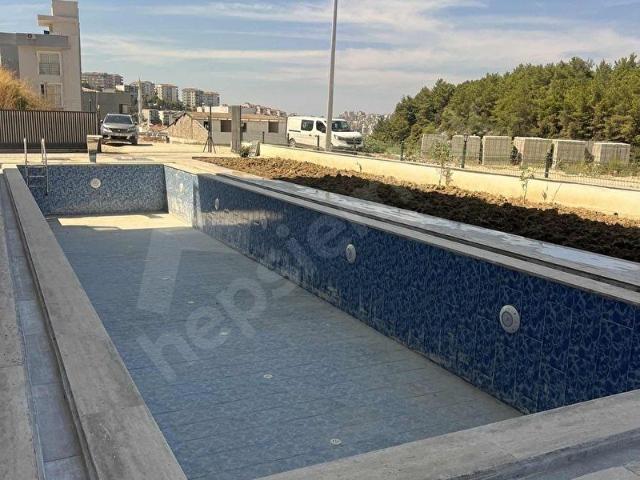 KUŞADASI MERKEZDE FUL YENİ EŞYALI ACİL KİRALIK DAİRE