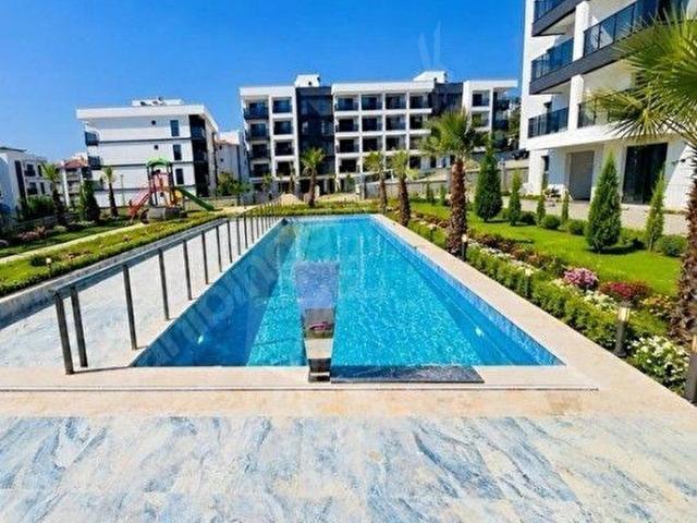 KUŞADASI MERKEZE YAKIN ACİLLLL SATILIK YERDEN ISITMA ARAKAT 2+1 DAİRE