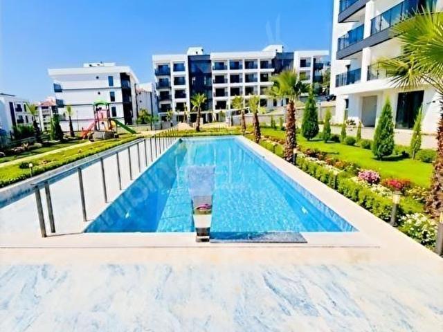 KUŞADASI MERKEZE YAKIN SİTE HAVUZLU SIFIR YAPI ŞOK FİYAT 2+1 SON