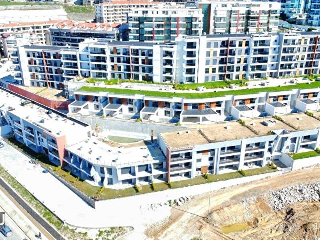 KUŞADASINDA DENİZ MANZARALI 3+1 KAPALI MUTFAKLI DAİRELER