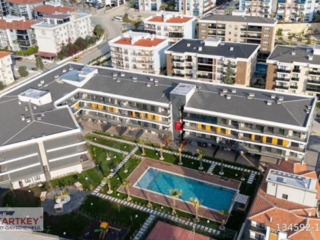 KUŞADASI'NDA HAVUZLU DOĞALGAZLI KİRALIK 1+1 DAİRE