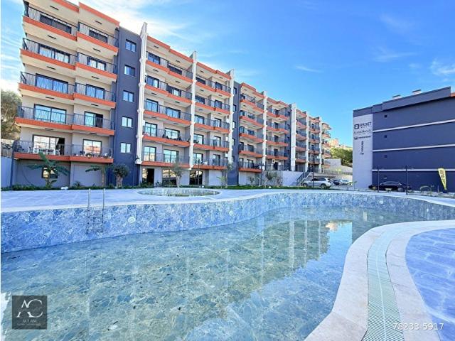 KUŞADASINDA SATILIK MERKEZI KONUM724 GÜVENLİKHAVUZBAHÇEKOMBİLÜXFIRSAT DAİRELER