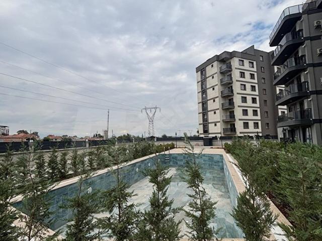 KUŞLUBAHÇEDE HAVUZLU SİTE İÇİ SATILIK 2+1 FIRSAT DAİRE