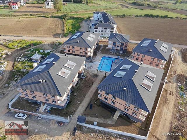 KUMBAĞ'DA HAVUZLU AQUPARKLI SİTEDE BAHÇELİ 1+1 SATILIK DAİRE