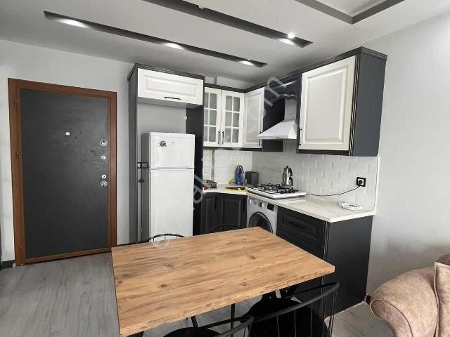 Kulepark~farkıyla~btü~üniversite~yanı~1+1~sıfır~eşyalı~balkonlu