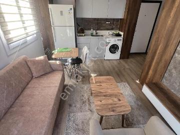 Kulepark~farkıyla~çok~geniş~45~m2net~oturumlu~1+1~eşyalı~satılık