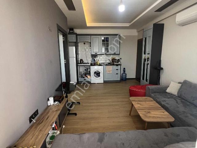 Kulepark~farkıyla~çok~geniş~48~m2net~oturumlu~1+1~balkonlu~