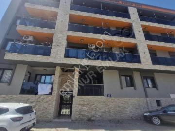 Kusadası Davutlar Merkezde Ayrı Mutfak 1+1 Satılık Daıre