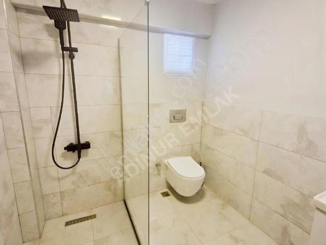 Kusadası Davutlar Merkezde 3+1 Ayrı Mutfaklı Daıremız Satılık