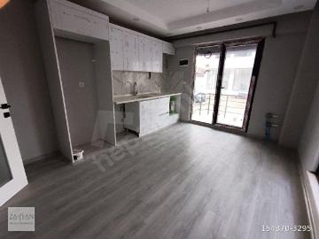 L. MERKEZİ KONUMDA SIFIR HİÇ OTURULMAMIŞ 1+1 GÜNEY CEPHELİ LÜX DAİRELER.