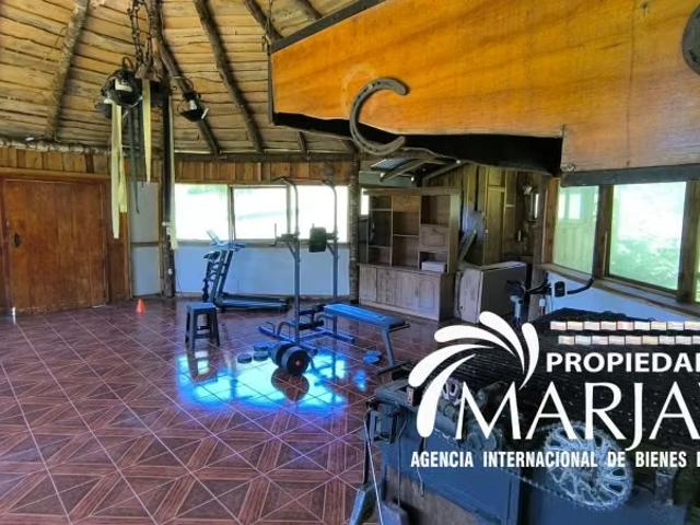 La propiedad de 5.000m² con 2 casas + quincho villarrica | 7 dormitorios por 340000. 00 en Villarrica