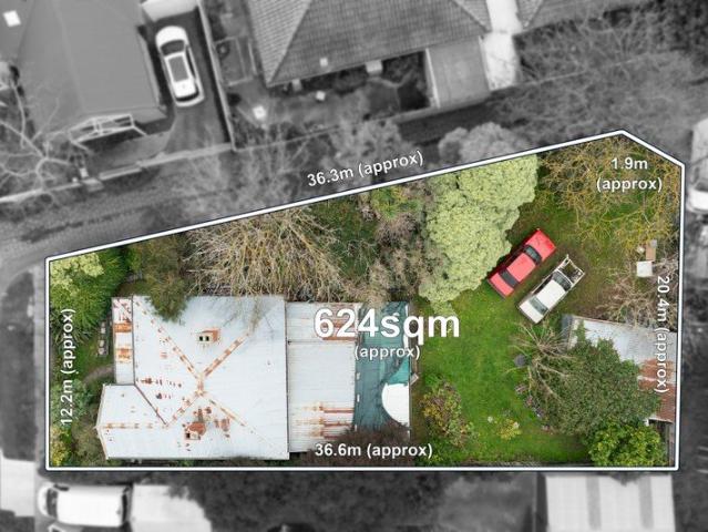 Land with Side & Rear Laneway Access