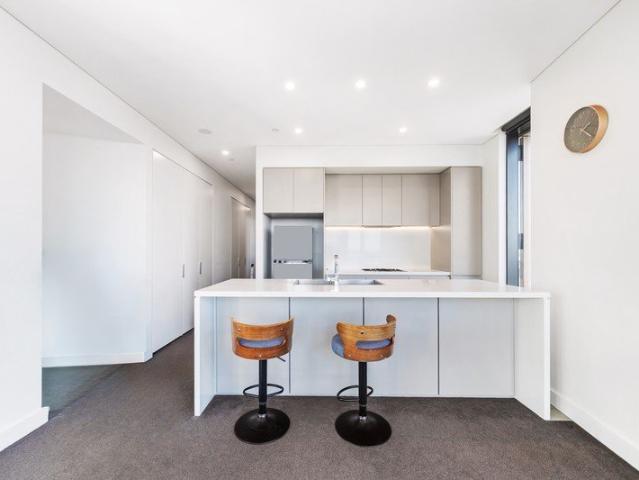 Landmark Tower in Sydney Olympic Park & Elevated Luxury Living with Spectacular Skyline Views