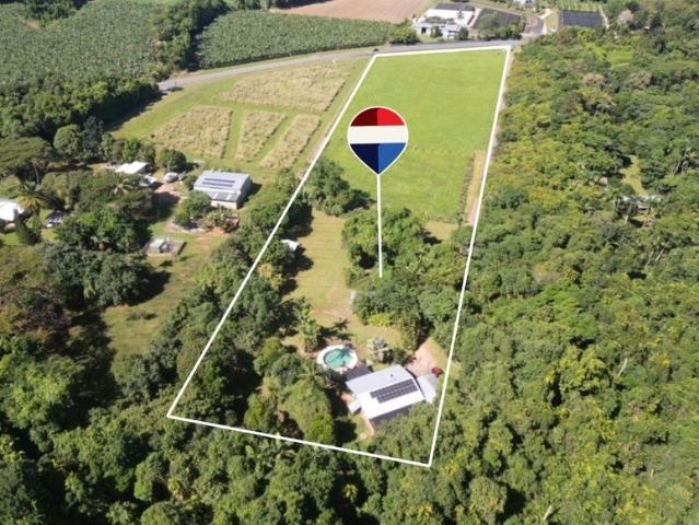 Lagoon Style pool, home and two sheds