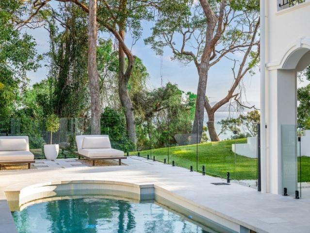 Lake Views, Pool Days, Golden Evenings. An Extraordinary Home of Grand Proportions
