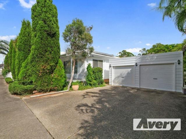 Lakeside Living in a Charming Three Bedroom Property