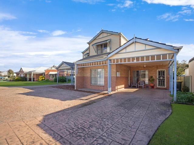 Lakeside Living in a Sought After Location