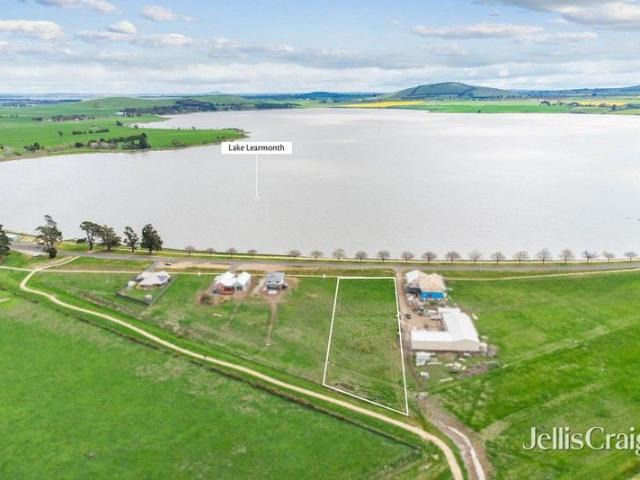 Lakeside living on over ¾ acre