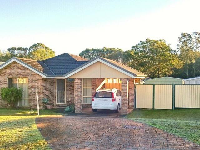 Lakeside living, with wide side access and endless potential