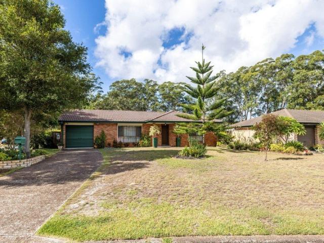 Lakeside Living with Comfort, Convenience & Potential