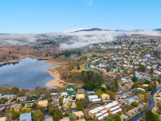 Lakeside Living with Spectacular Views & Walk to Town Convenience