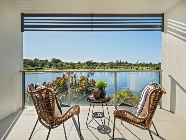 Lakeside Living with Stunning Skyline Views