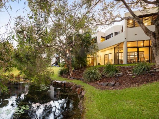 Lakeside Luxury Living Moments from the Beach