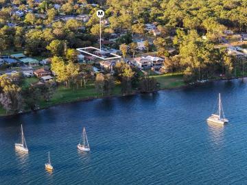 Lakeside property with dual occupancy potential