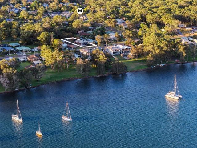 Lakeside property with dual occupancy potential