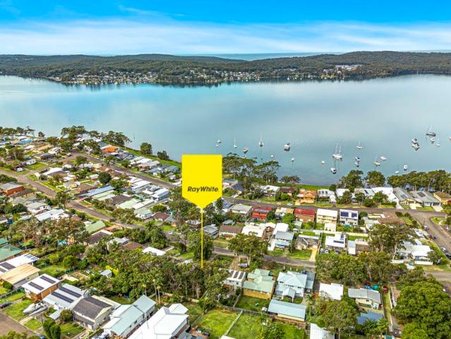 Lakeside Renovator on Approx 898 sqm Block Offering Space, Views and Potential