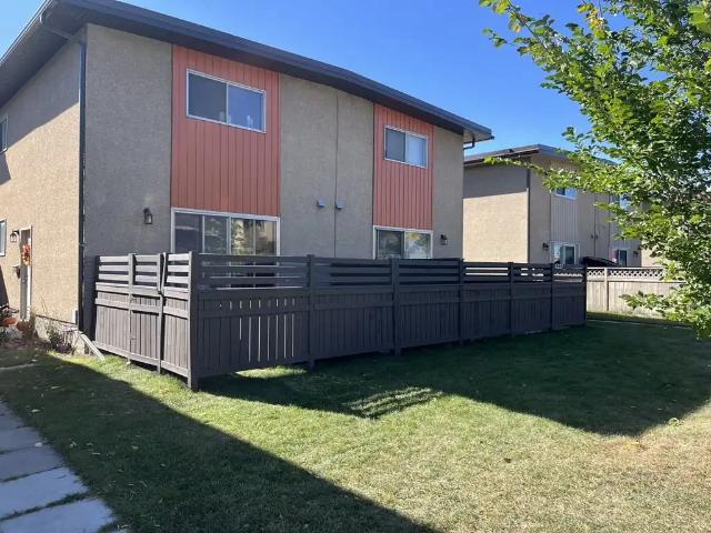 Large 2 bedroom, with private fenced yard, right on bike path