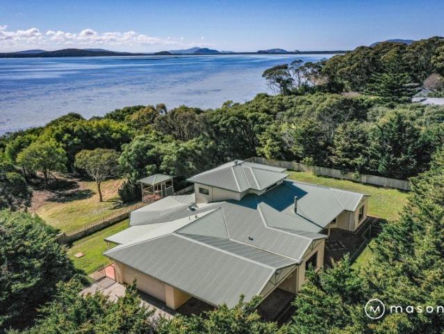 Large Waterfront Home Revival Ready