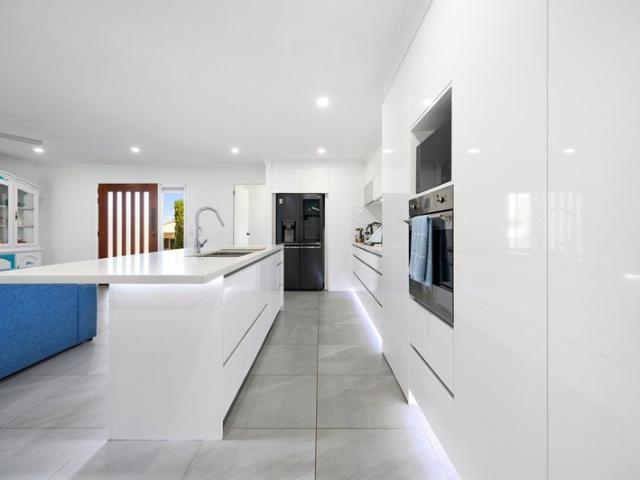 LARGE BACK YARD AND ROOM FOR THE WHOLE FAMILY BEAUTIFULLY RENOVATED 4 BEDROOM HOME