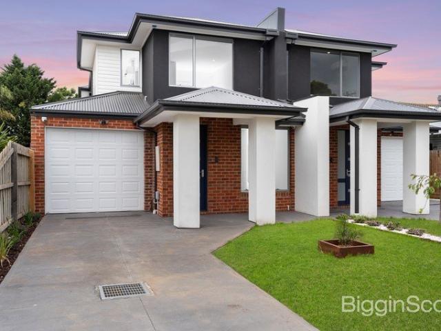 Large Contemporary Comfort and Two Living Spaces in a Booming Location!