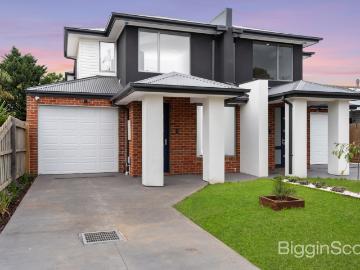 Large Contemporary Comfort and Two Living Spaces in a Booming Location!