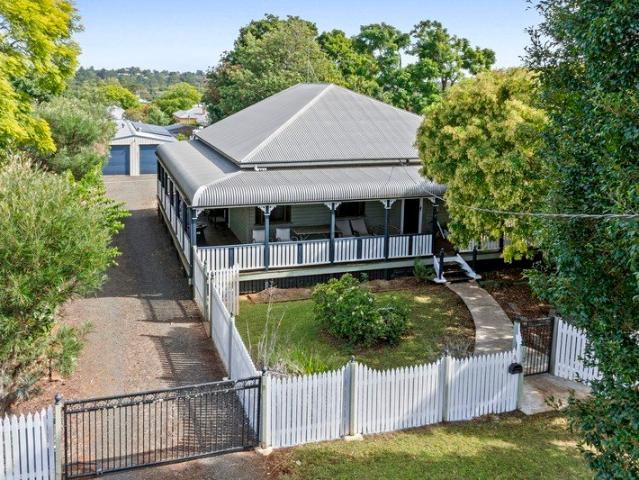Large Dual Title Block, Timeless Queenslander & 15x7.5m Shed A Rare Opportunity!