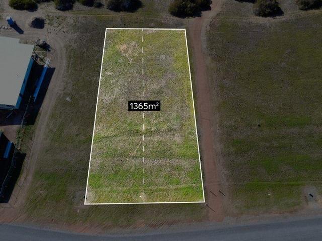 Large duplex allotment just moments from the beach.