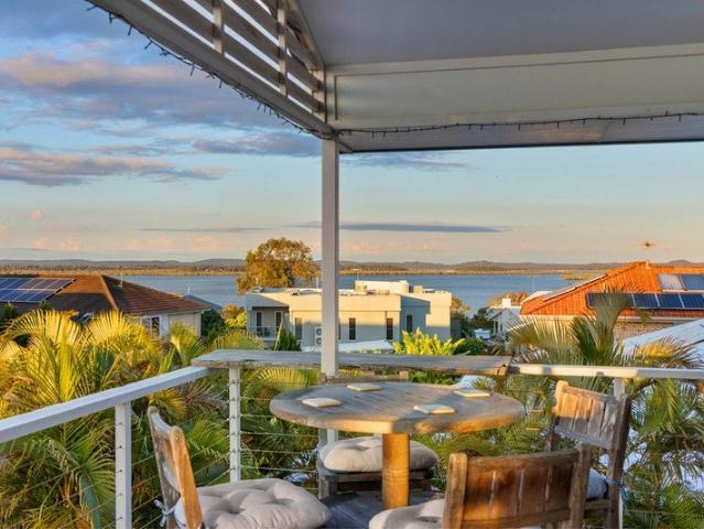 LARGE FAMILY HOME WITH BAY VIEWS IN TIGHTLY HELD REDLAND BAY POCKET